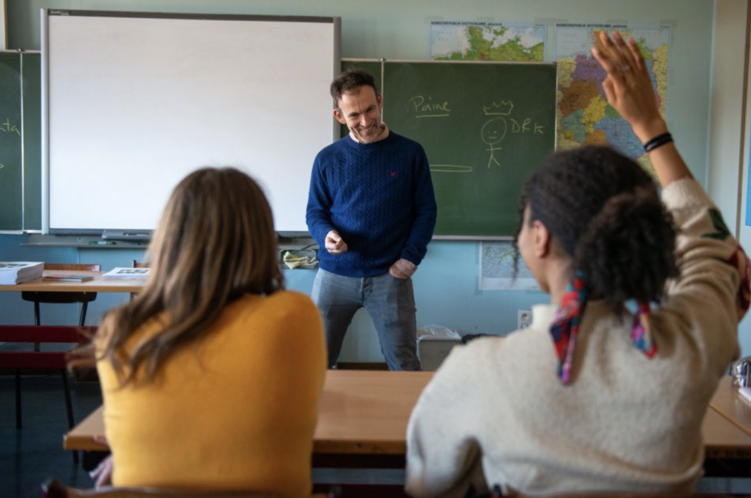 Matthew Pye teaching in a classroom